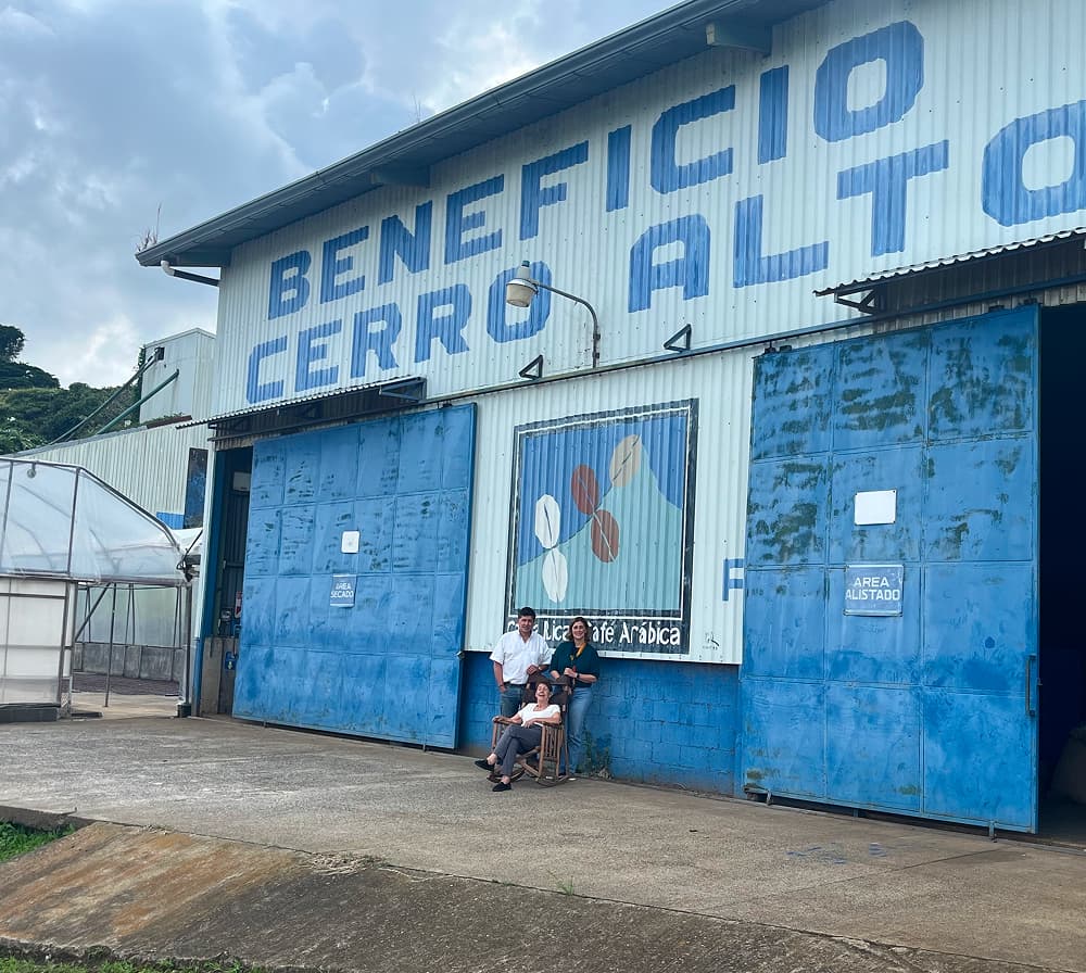 Three generations in front of the main building